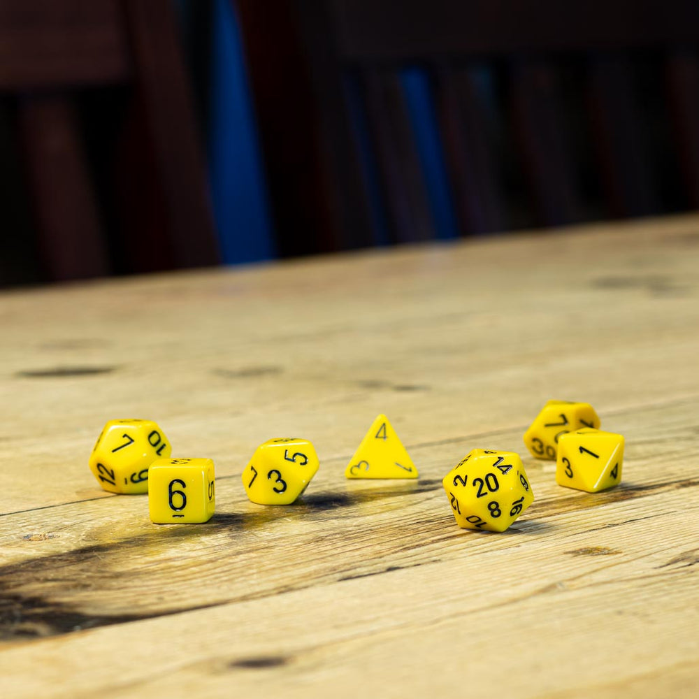 Chessex #25402 - Opaque Yellow / Black Polyhedral (7ct)
